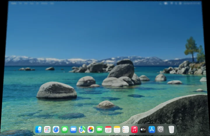 The desktop through a pane of glass that starts to lean and soften, with the lid at 75 degrees.